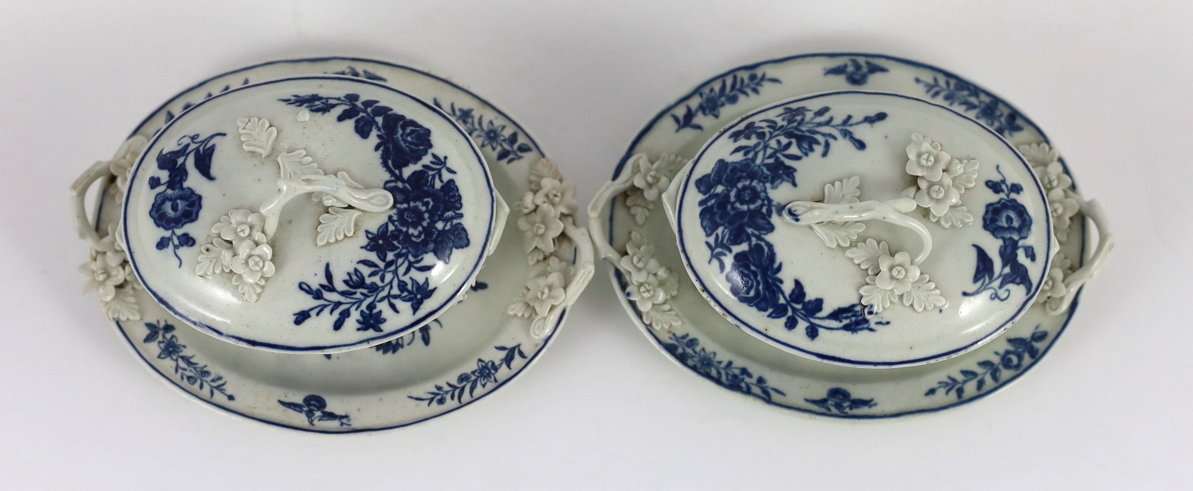 A pair of Caughley blue and white butter tubs, covers and stands, c.1780, stands 19cms wide, tubs and covers 9cms high